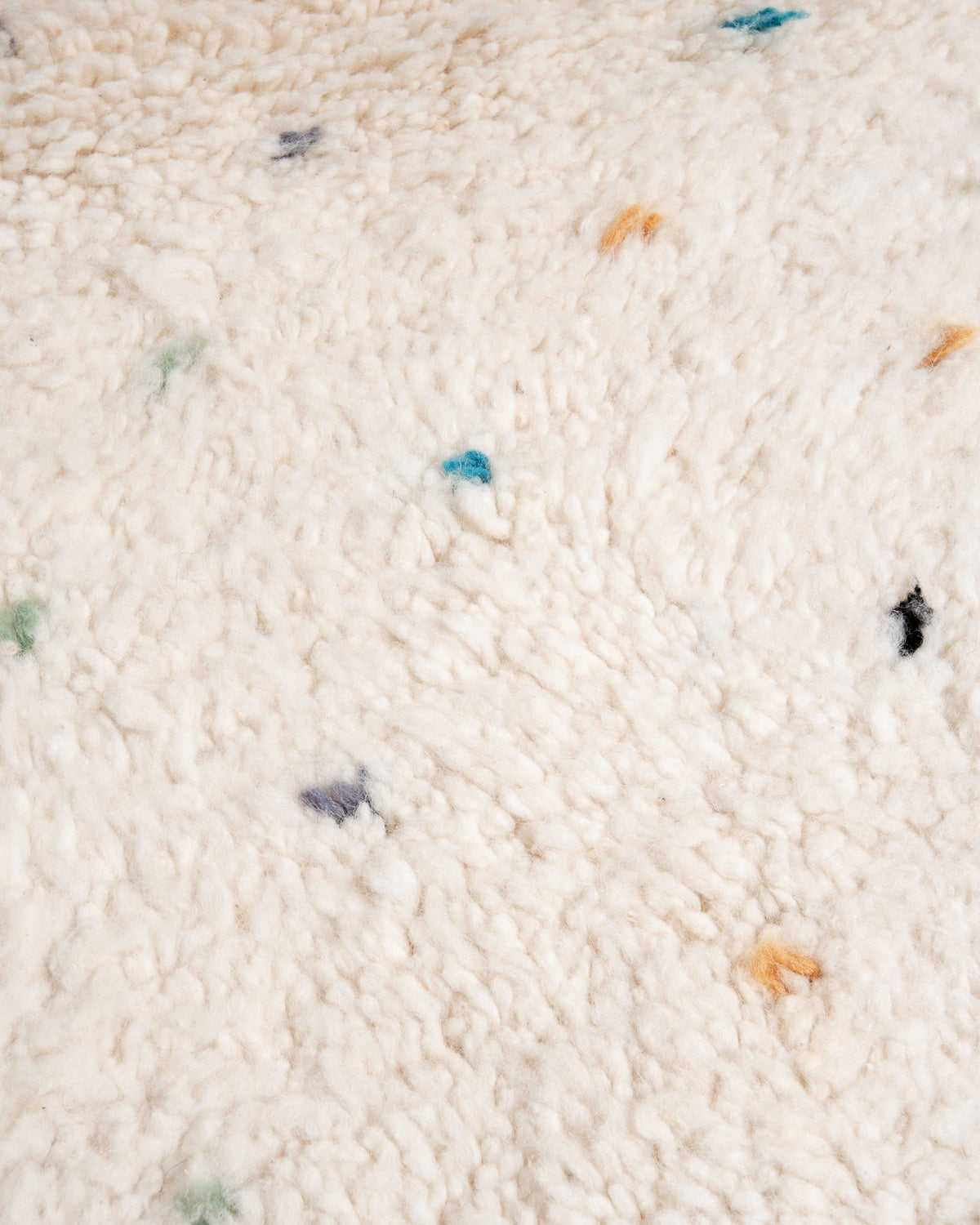 Modern, designer, handcrafted Berber rug from Morocco. Beniourain carpet with beautiful colours and patterns and fluffy wool texture.